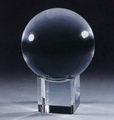 clear crystal ball on crystal cube base